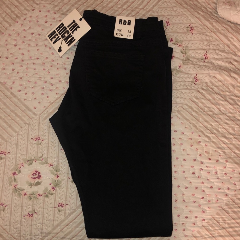 Never worn black ripped jeans U.S size 8 by Boohoo